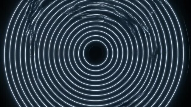 Glowing blue concentric circles on dark background