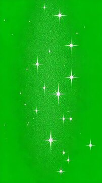 Sparkling white star shapes twinkling on a vivid green background. Abstract festive glittering design with bright star figures for decoration.