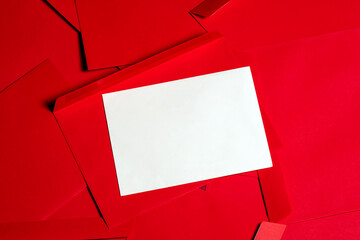 Blank White Card on Red Envelopes for Valentine&rsquo;s Day or Christmas