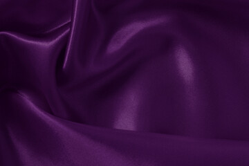 Purple fabric cloth texture for background and design art work, beautiful crumpled pattern of silk or linen.