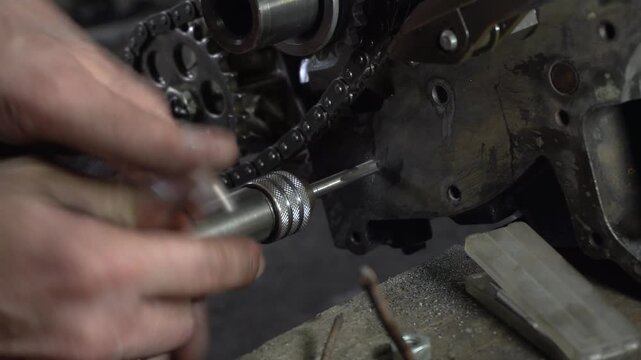 repair and assembly of a stock turbocharged engine for a drift car installation of a custom tensioner and oil pump chain dampener drilling and thread cutting