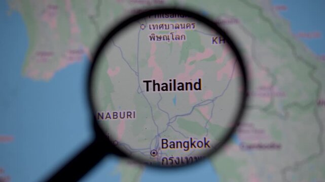 Thailand map under magnifying glass highlighting, Cambodia border skirmish context, tourism economy, travel routes to Phuket, Krabi and Bali, reflecting geopolitics, culture and cross border tensions.