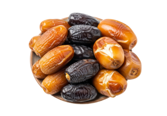 assorted dates on plate, golden brown and dark medjool varieties