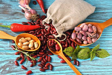 Assorted Beans with Garlic, Chili and Herbs on Blue Wood