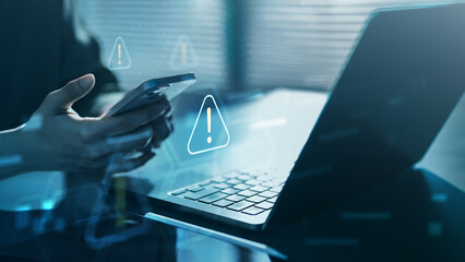Digital firewall alert on laptop and smartphone showing cyber security defense, network protection, data risk warning, and real-time system monitoring in modern technology.