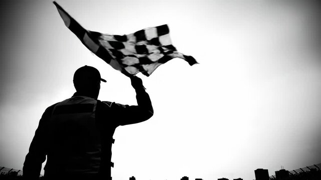A person holding a checkered flag in their hand waving it in the air on a white background