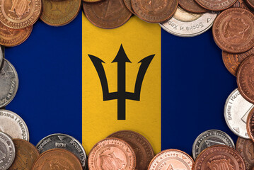 Coins on flag of Barbados trading investment business currency concept
