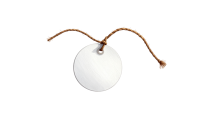 A blank price tag on a string against a white background