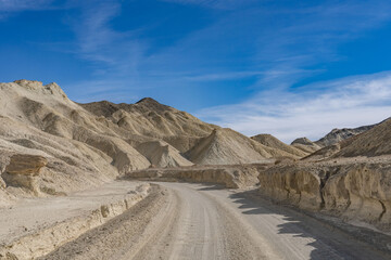 Death Valley National Park, Inyo County, California. Twenty Mule Team Road. (Tf）Playa and playa margin rocks of Furnace Creek basin. Twenty Mule Team Canyon
