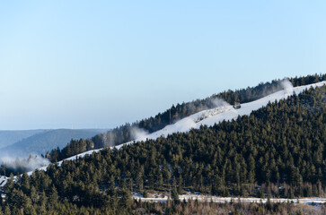 Artificial Snow Production On Sunny Ski Slope