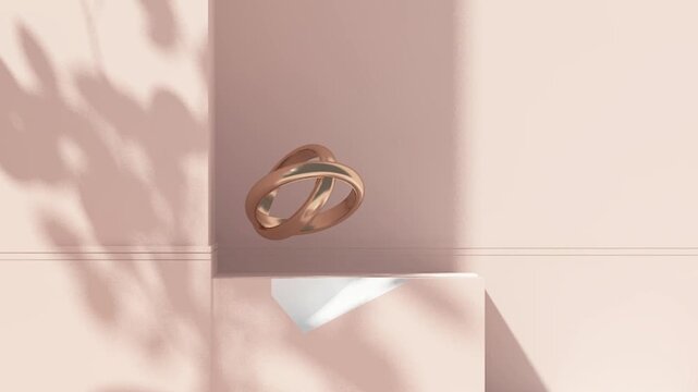 A minimalist shot of a rose gold romantic wedding ring opener invitation with copy space cinematic animation for marraige ceremony intro