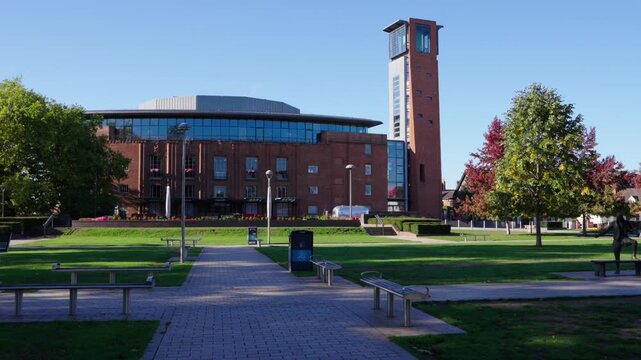 STRATFORD upon AVON, ENGLAND - 22ND SEPTEMBER 2025: POV clip walking towardsRoyal Shakespeare Theatre in Stratford upon Avon on a sunny autumn morning.