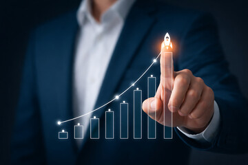 Businessman hand touching virtual rocket launching from bar chart showing rapid startup growth and financial success boost for corporate innovation and development strategy concept