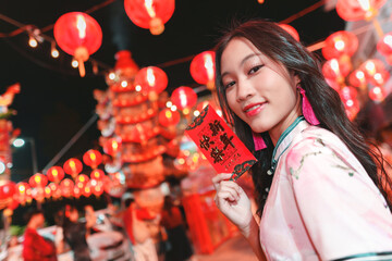 Celebratory Girl Holding Red Envelope During New Year Festival Night