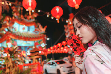 Girl Celebrating New Year with Red Decorations and Lanterns