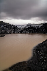 view of the Solheimajokull Glacier lagoon and the Myrdalsjokull Glacier ice cap outlet