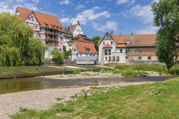 Half timbered houses on banks of the Donau in Riedlingen, seen from the island in the stream