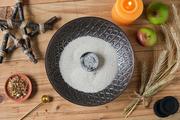 Preparations for a Lammas Ritual with Incense, Herbs and Harvest Symbols