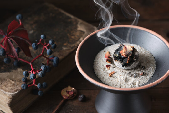 Mabon incense ritual with frankincense, resins, and dried herbs - spiritual mood