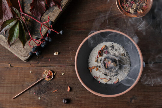 Mabon incense ritual with frankincense, resins, and dried herbs - spiritual mood