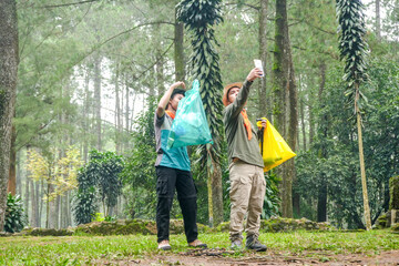 Adventurers Capture Forest Memories with Mobile Phone Selfies