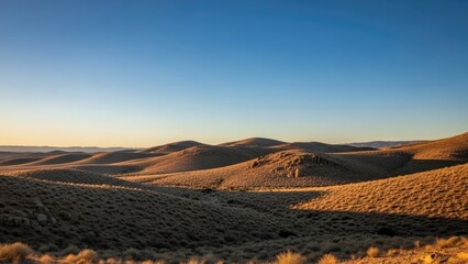 Rolling Hills and Mountains at Sunset.