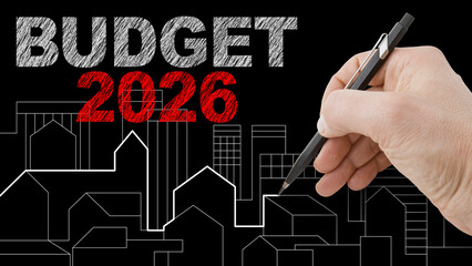 BUDGET 2026 AND REAL ESTATE CONCEPT IN BUILDING ACTIVITY AND CONSTRUCTION INDUSTRY with hand writing text