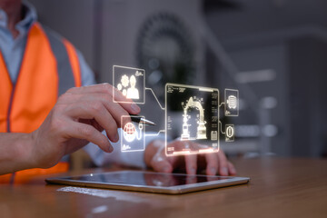 Engineer using digital tablet to control and monitor robotic arm system in smart factory. Industrial automation, predictive maintenance, and IoT technology in manufacturing innovation concept.