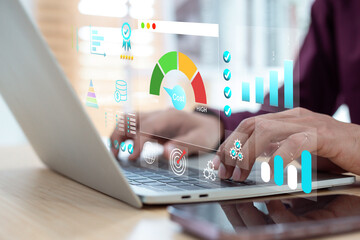 Business Data Analysis and Cost Management with Online KPI Dashboard on Laptop Screen.