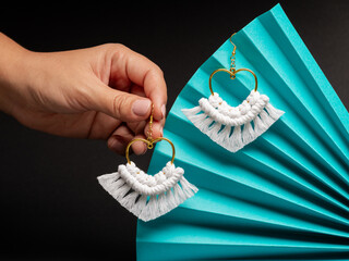 Minimalist Macrame Heart Shape Earrings with Golden Hoop on Fan © sandor
