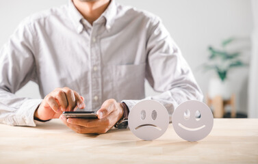 Emotional contrast, happy and sad faces represent customer feedback survey, showing mood health, person using smartphone to input opinions for services, reflecting satisfaction dissatisfaction