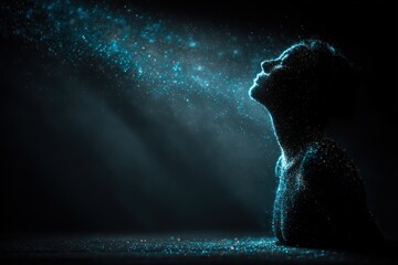 Silhouette in blue light with particles rising in the air at night