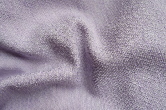 light violet textured viscose pique fabric in soft folds