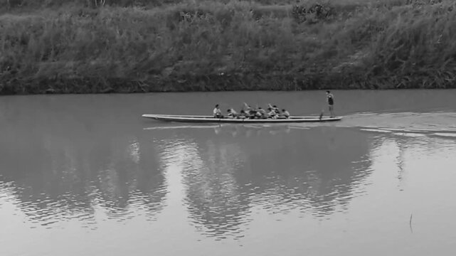 Blurred Long Boat in The River as Black and White Tone with Noise