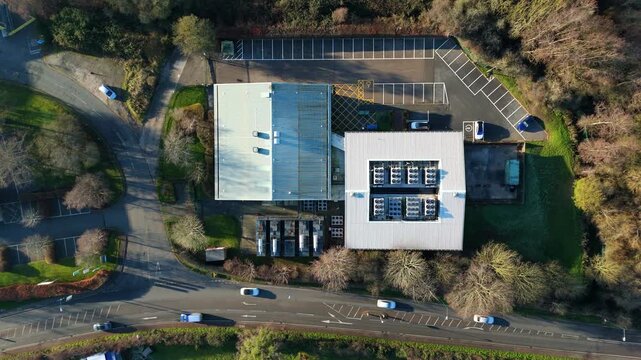Top down aerial view of Critical data center infrastructure, HVAC fans and cooling units on roof for Quantum computing cloud storage IT services, futuristic server air cooled in Redditch, UK
