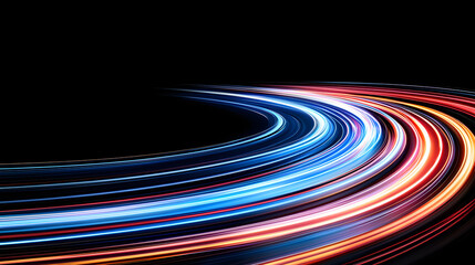 Colorful light trails create dynamic and vibrant motion effect against black background
