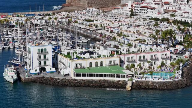 Puerto de Mog&aacute;n Marina and Little Venice White Village, Gran Canaria, Canary Islands - 4K Cinematic Aerial