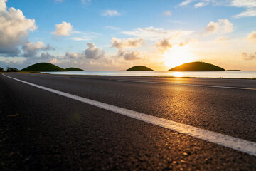 Sunset Over Empty Coastal Highway