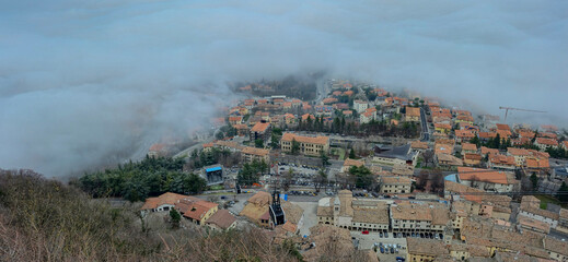 Mystical panorama from the Republic of San Marino with fog and clouds