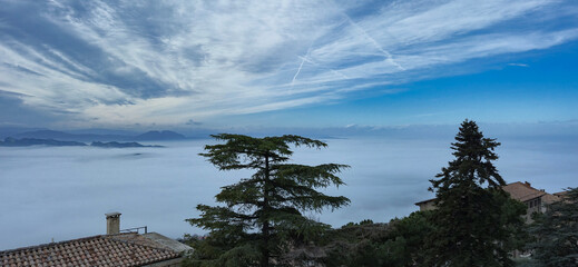 Mystical panorama from the Republic of San Marino with fog and clouds