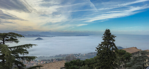 Mystical panorama from the Republic of San Marino with fog and clouds