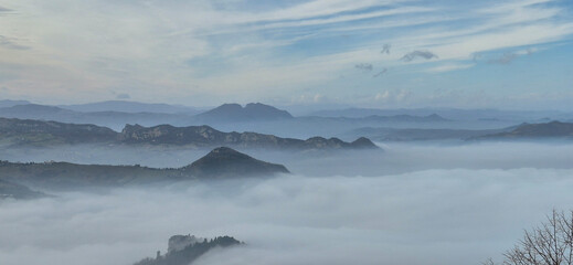 Mystical panorama from the Republic of San Marino with fog and clouds
