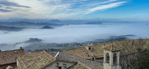 Mystical panorama from the Republic of San Marino with fog and clouds