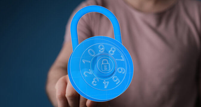 Conceptual image of a person touching a digital padlock symbol, representing data security, privacy, and online - Powered by Adobe