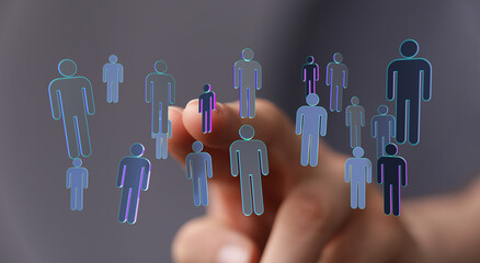 Hand pointing at a collection of digital figures representing a network, team, or community. Connection and col