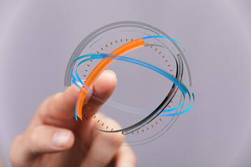 A person's finger interacts with a digital interface, symbolizing technology, futuristic concepts, and innovation in a visual represe