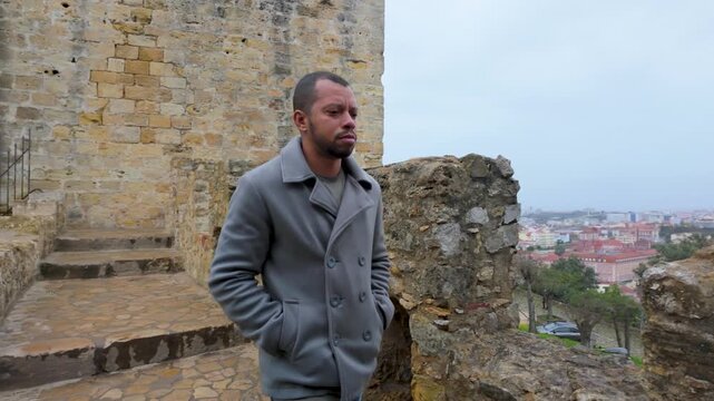 Man looking at the city skyline.