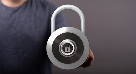 Image of a person holding a padlock, representing data security, privacy, and protection. Ideal for illustratin