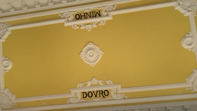 Decorative yellow interior wall with vintage sign