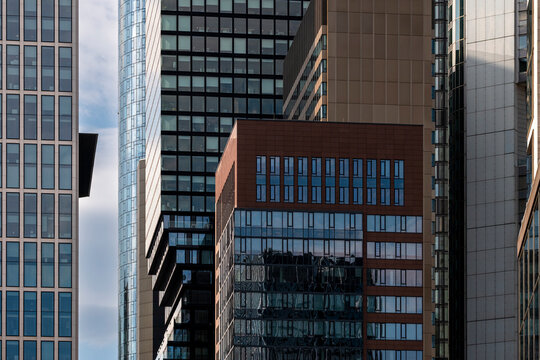 Modern architecture city urban tower office business corporate facade in Frankfurt shaping a strong contemporary skyline
